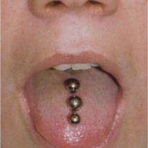 Triple tounge piercing triple tunge