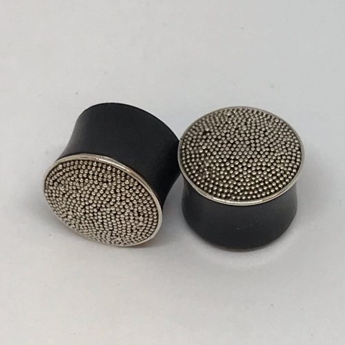 Silver and wood plugs plugs