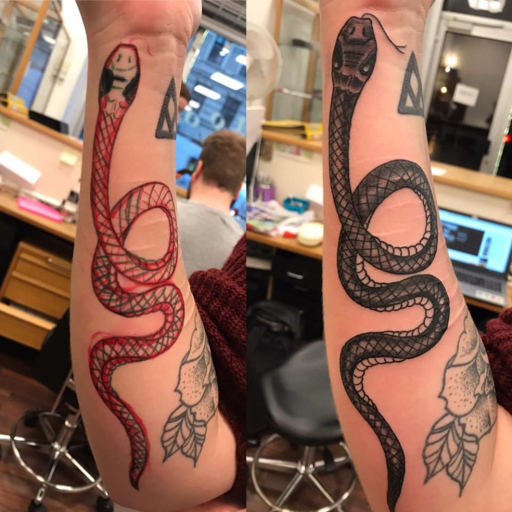 Free hand snake tattoo